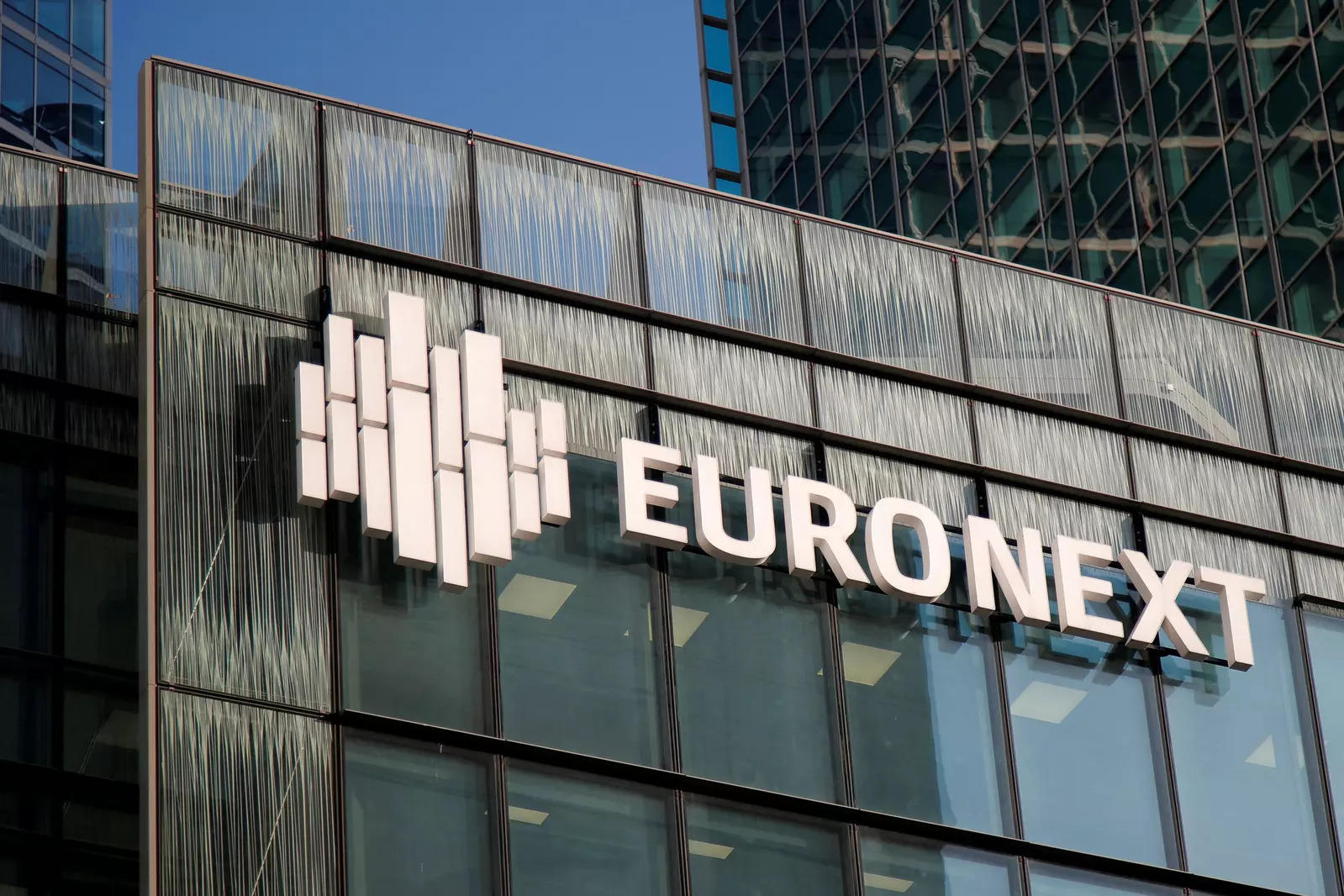  FILE PHOTO: The logo of stock market operator Euronext is seen on Euronext headquarters at La Defense business and financial district in Courbevoie near Paris, France, November 21, 2019. REUTERS/Charles Platiau/File Photo